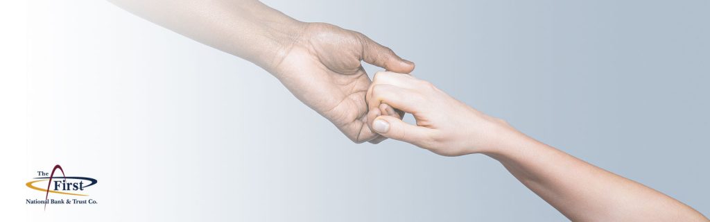 Charitable giving in the trust department, guy and girl holding hands.