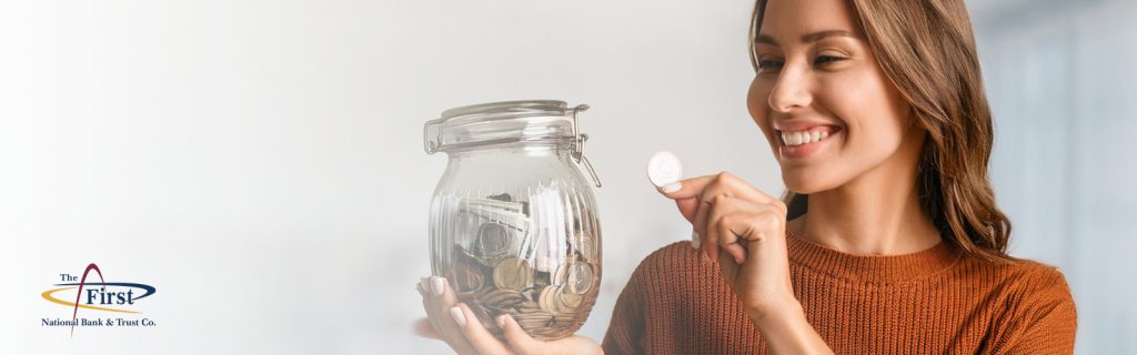 lady saving money in a jar header bank near me